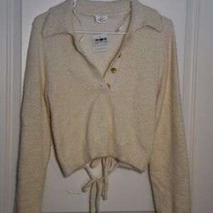 Elegant Cream V-Neck Sweater with Button Accents